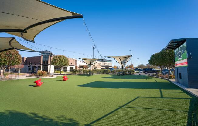 Shaded greenspace at nearby Shops at Willow Park feature open turf and seating offering a relaxed place to spend time outdoors close to home.