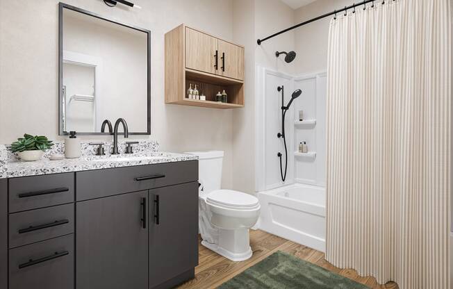 a bathroom with a shower and a sink and a toilet at Boardwalk at Research Park in Huntsville, Alabama 35811