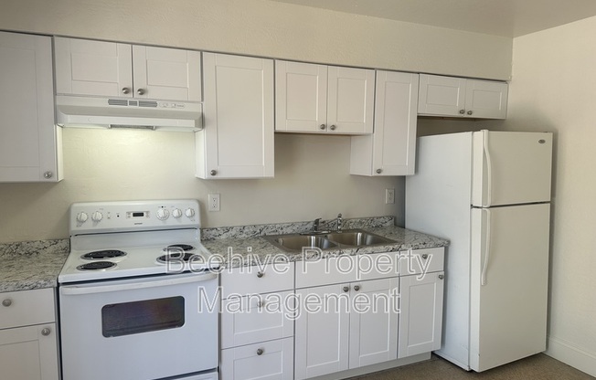 1102 E POLK ST