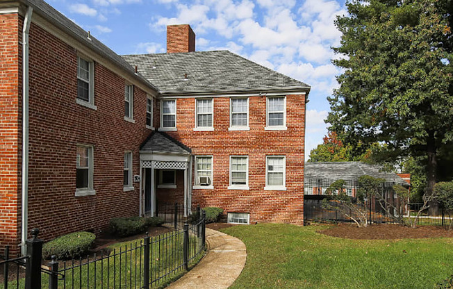 exterior of brick apartment building at hillside terrace apartments in washington dc