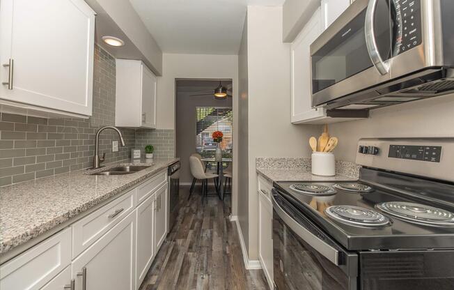 a kitchen with stainless steel appliances