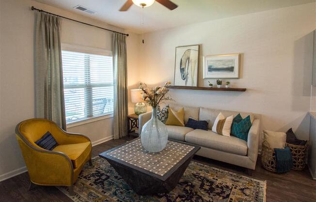 a living room with a couch and a table