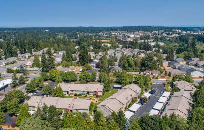 an aerial view of a neighborhood with houses and trees at Quartz Creek, Mountlake Terrace, WA, 98043