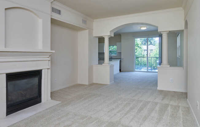 Carpeted Living Room with Fireplace