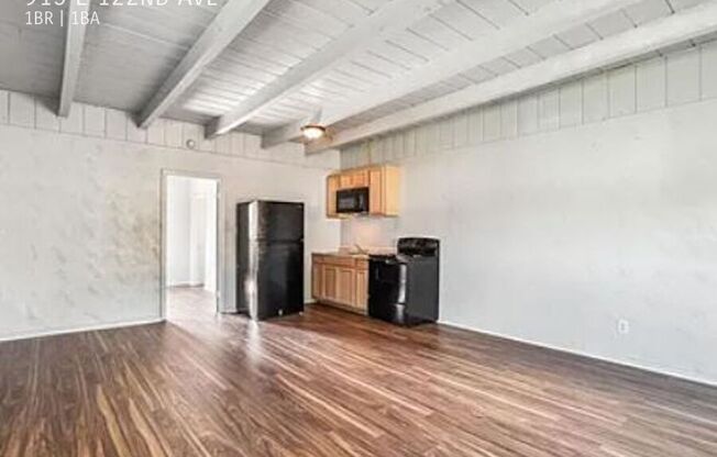 915 E 122 AVE