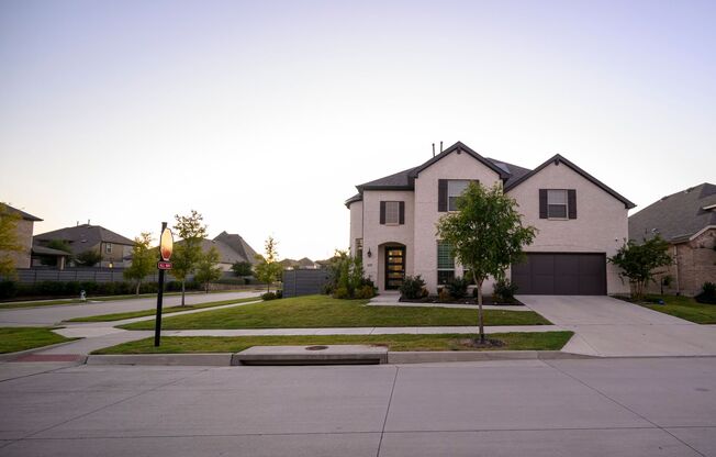 This stunning 4-bedroom, 4.5-bathroom home in the highly sought-after Union Park community of Aubrey.