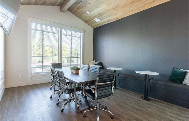 A conference room with a long table and chairs at Forestplace Apartment Homes, Forest Grove, OR, 97116