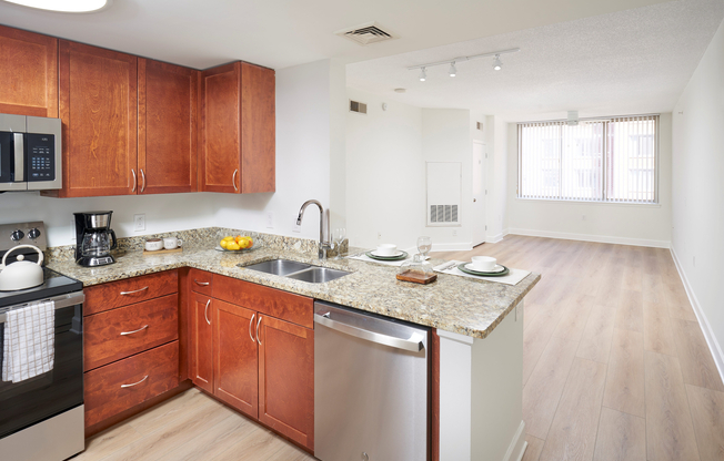 Entertain in style with the Ashton’s open-concept living area, featuring modern vinyl-plank flooring and smart Nest thermostats.