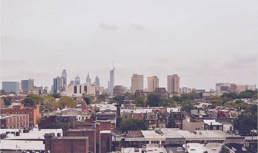 a cityscape of a city with tall buildings