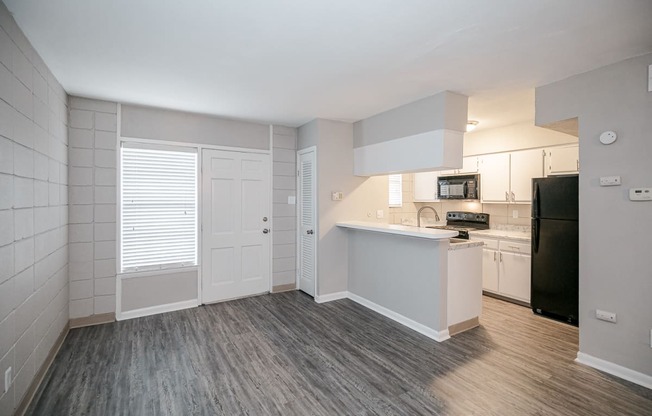 Wood Floor Living Room at Arbor Pointe at Hillcrest, Arkansas