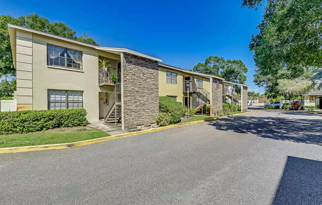 A sunny day at the apartment complex with clear blue skies.