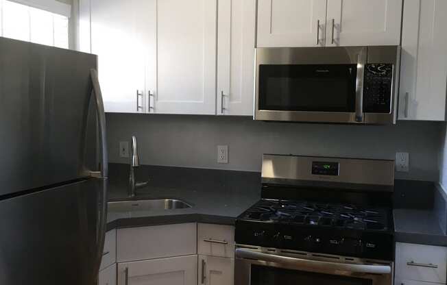 Kitchen with gray countertops