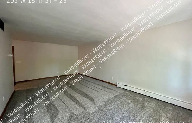 205 W 18 ST