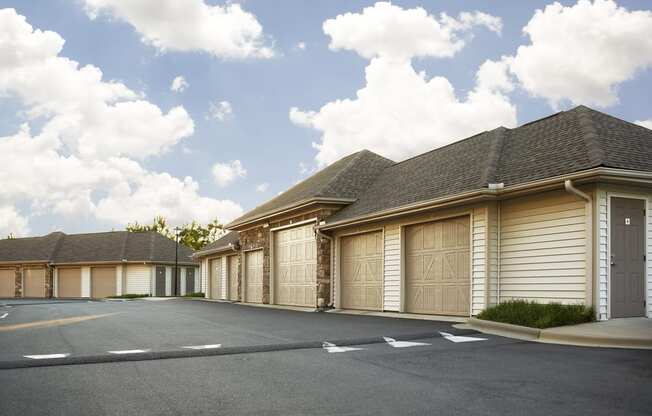 a row of garages in a parking lot