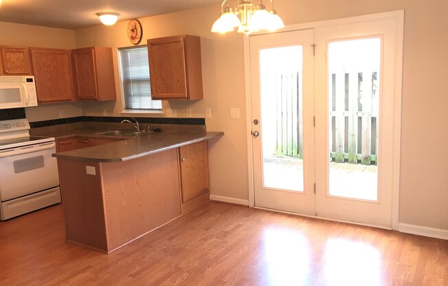 Updated End Unit Townhome with Garage
