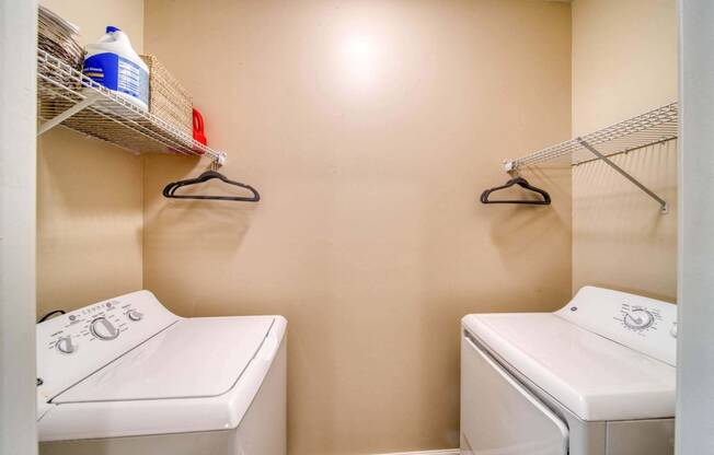 a washer and dryer in a laundry room at Meridian Obici, Suffolk, VA 23434