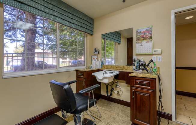 a dentist office with a chair and sink