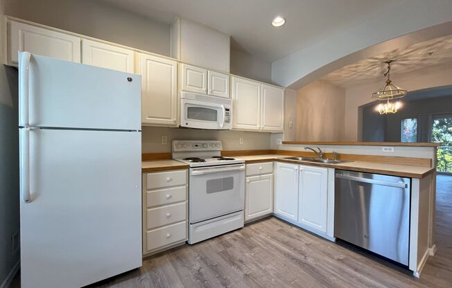 Inviting 2-Bed, 2-Bath Townhome with Updated Kitchen & Gas Fireplace