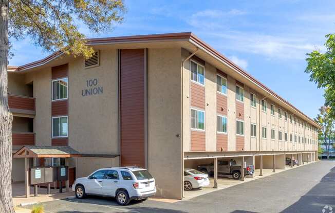 a large building with a car parked in front of it