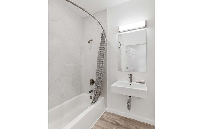 a close up of a sink and a mirror