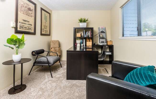 a room with a desk and chair and a window Copper Ridge Apartments, Renton, 98055