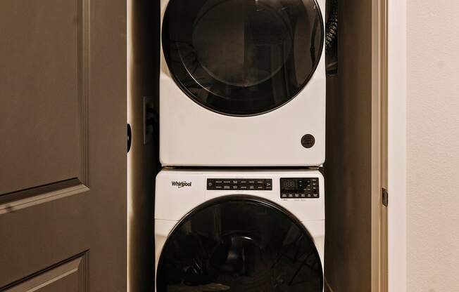 Full-size stackable washer and dryer in unit at 44 West Luxury Living, Valley Park, MO