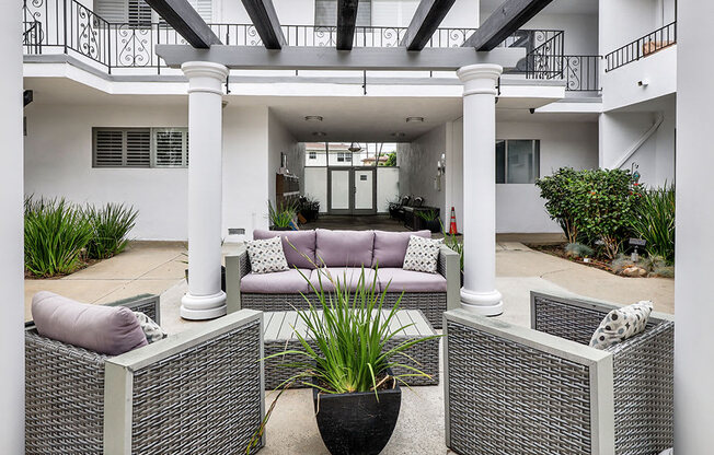 Shaded courtyard gazebo for relaxing or reading.