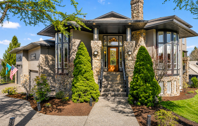 Stunning 5-Bedroom Bull Mountain Estate with Dual Living, Chef's Kitchen & 4-Car Garage