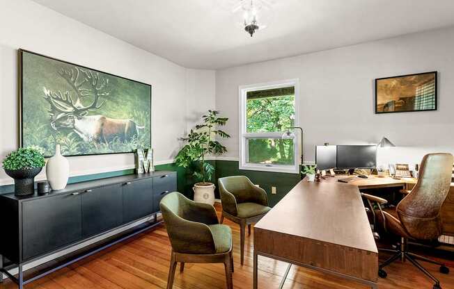 Leasing office with a desk and chairs