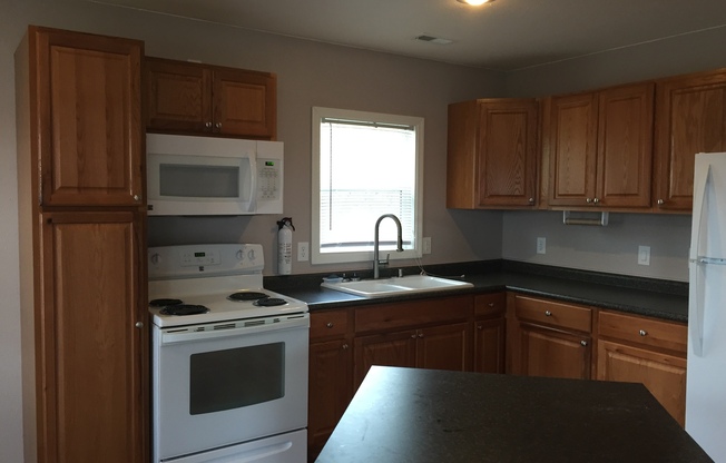 Charming 2-Bedroom Home with Porch & Storage Space