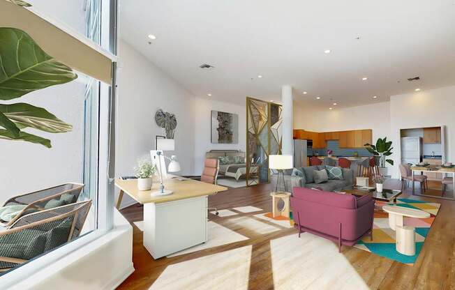 A living room with a pink couch and a white coffee table at Esprit Marina del Rey, 90292