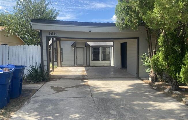 Large 2/2 duplex with a 2 car carport