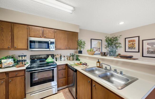 Stainless steel appliances in apartment kitchen at River Walk