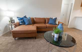 Living Room Sofa at Sandstone Court Apartments, Greenwood, IN, 46142