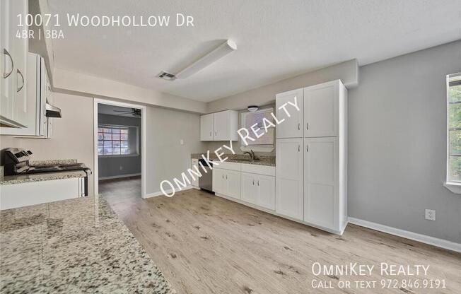 10071 WOODHOLLOW DR