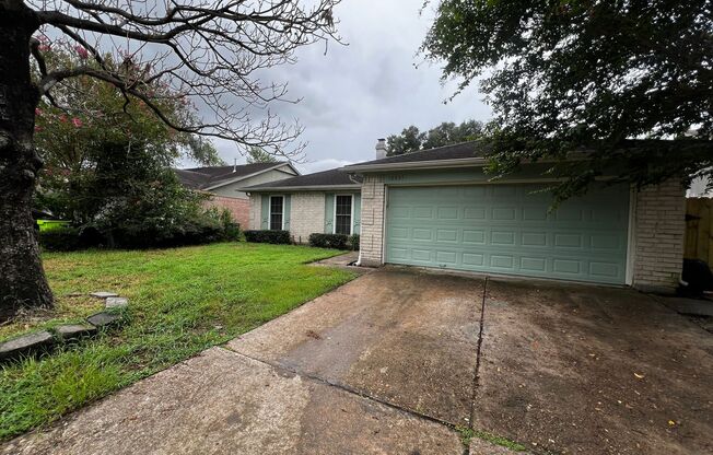 4 Bedroom 2 Bathroom Cypress Home with Fireplace and Fenced Backyard