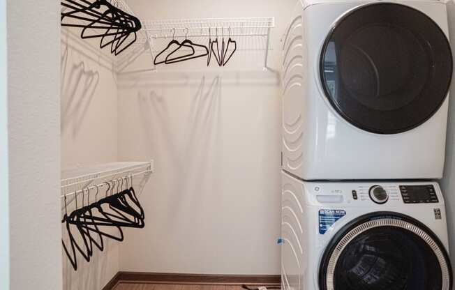 a washing machine and dryer in a laundry room at The Yards and Backyards, Minnesota, 55075