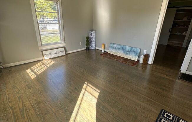 2 Bed House w/ Wooden floors, Large Front porch, Central HVAC & Huge yard!