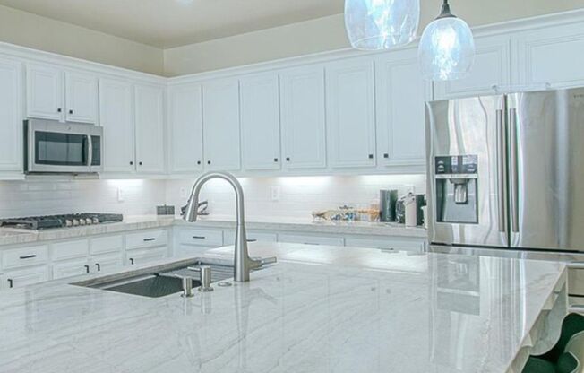BEAUTIFUL 2 STORY 5 BEDROOM 4 FULL BATHROOM HOME
