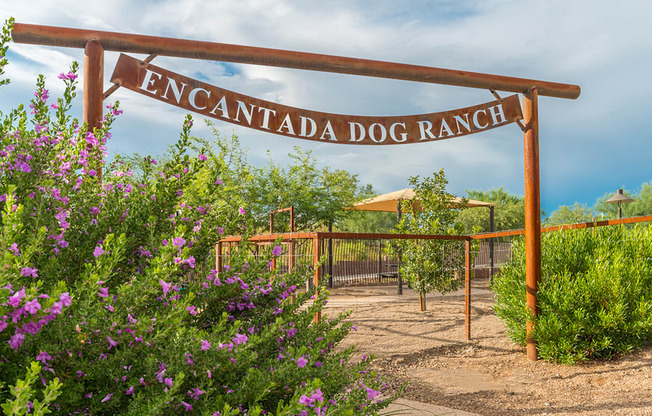 a sign that reads the entrance to the encyclopaedia dog ranch