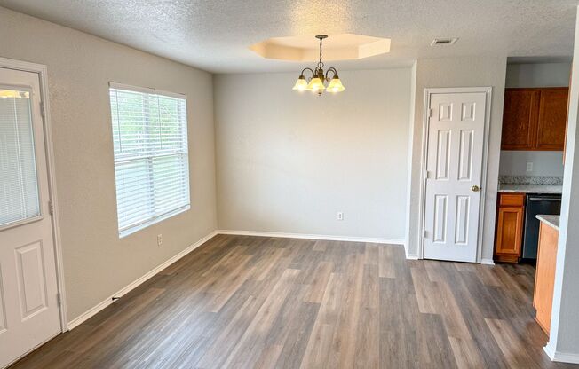 Available NOW This charming 1 story, 3 bedroom, 2 bath house could be your next home! Beautiful wood look flooring throughout. Large master bedroom suite includes master bath and walk in closet. Washer/dryer utility room is located near the kitchen. Kitch
