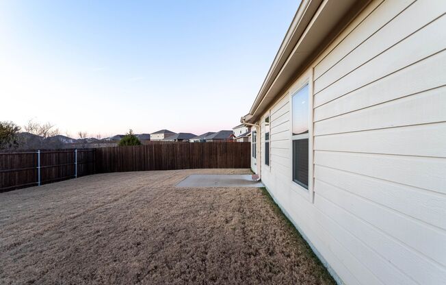 Located in the Trails at Riverstone community, this inviting 5-bedroom, 2-bathroom home offers a comfortable layout