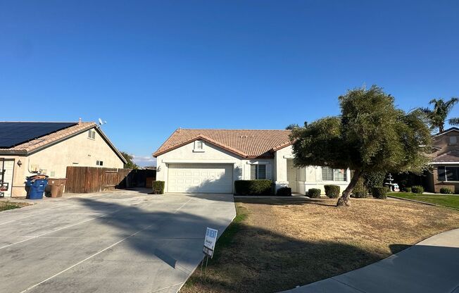 4-bedroom, 2-bathroom home nestled in a peaceful cul-de-sac