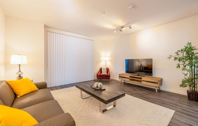 a living room with a couch and a coffee table