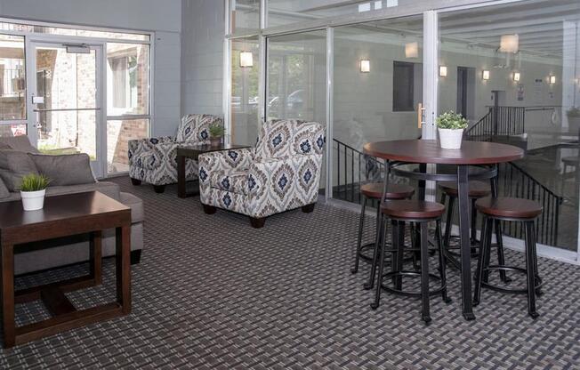 a community room with a table and some chairs