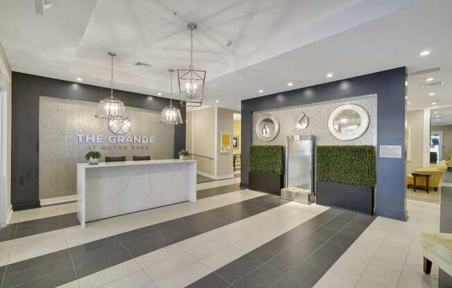 the grange lobby with reception desk and front doors