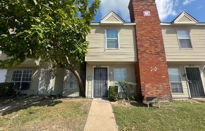 Two story unit with fireplace and backyard!