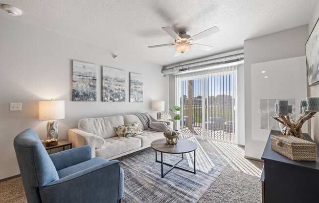 Spacious living room with neutral walls and ample natural light.