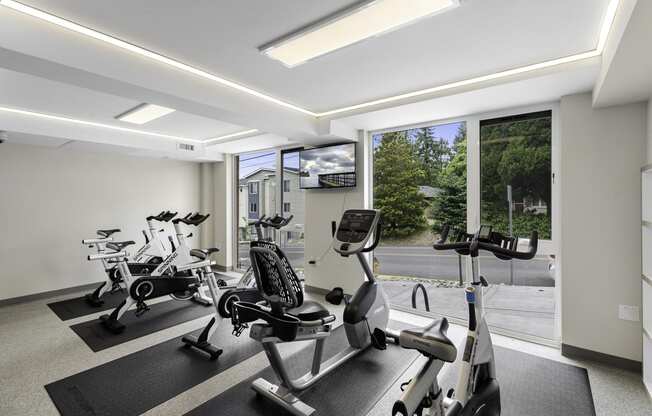 Resident Fitness Facilities filled with exercise equipment at Arabella Apartment Homes, Shoreline, 98155