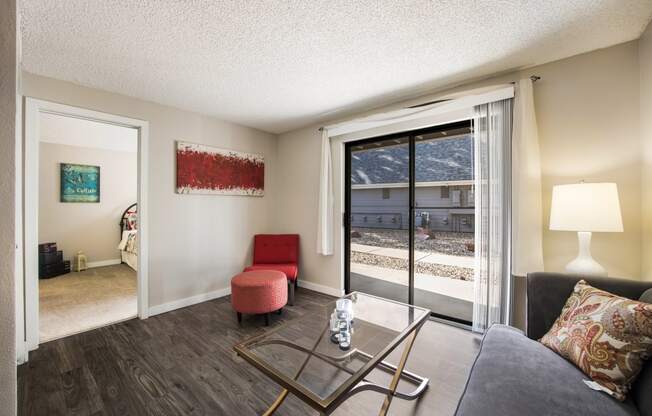 Apartment living room at Windmill Apartments, Colorado, 80916